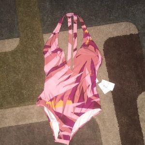 Brand new Volcom swimsuit in a size medium.